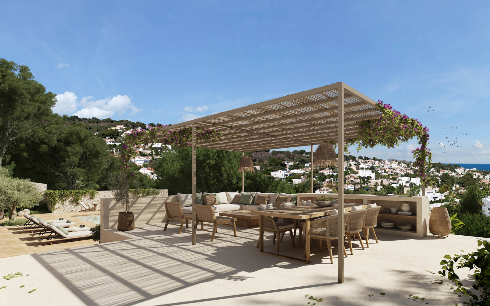 Terrasse surélevée avec pergola en bois et bougainvilliers, comprenant un espace repas et un salon extérieur avec vue dégagée sur la côte.