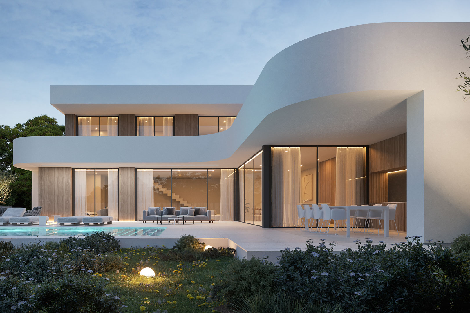 Villa moderne aux lignes courbes avec de grandes baies vitrées, une terrasse en grès cérame, un coin repas extérieur et une piscine éclairée au crépuscule.