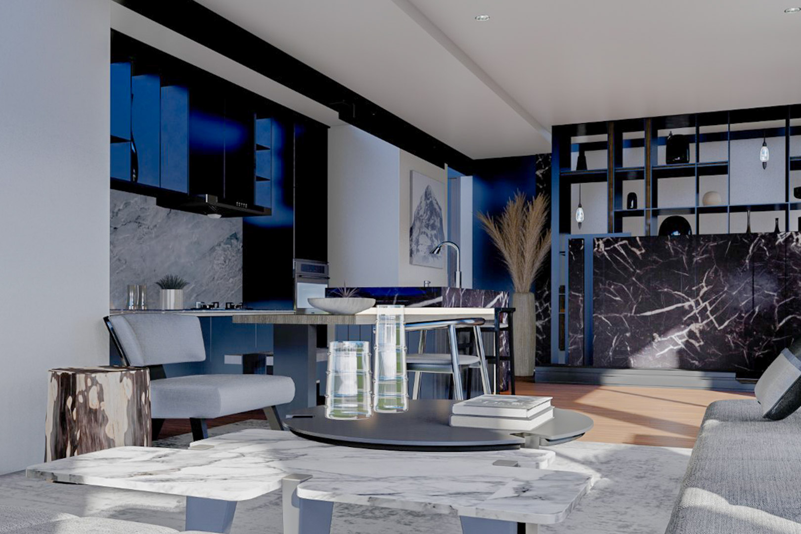 Vue du salon avec cuisine ouverte, mettant en valeur l'îlot en marbre et le mobilier aux tons bleus.