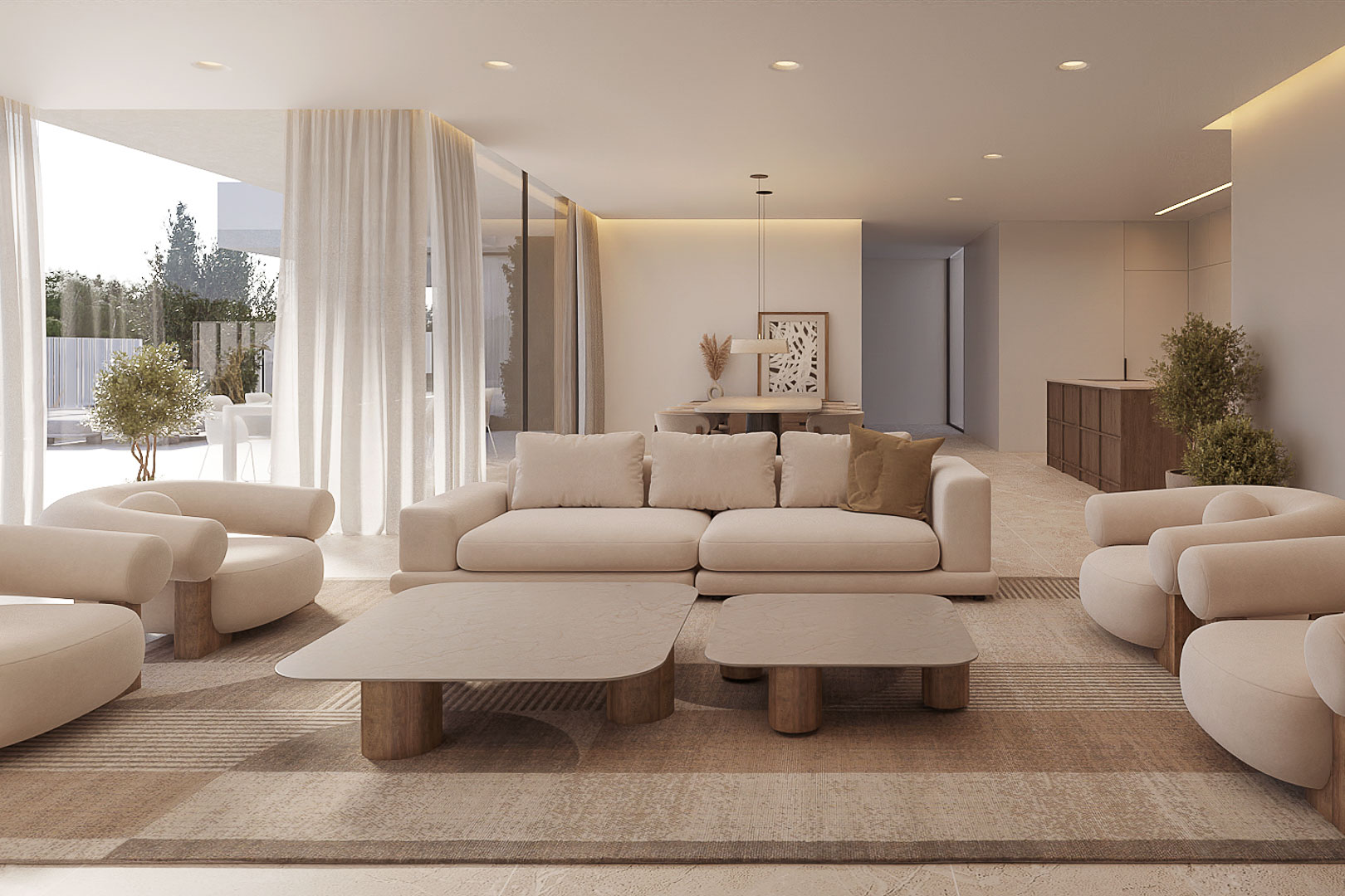 Salon ouvert avec mobilier aux lignes courbes, tables basses en pierre et grandes baies vitrées offrant une transition fluide vers l'extérieur.