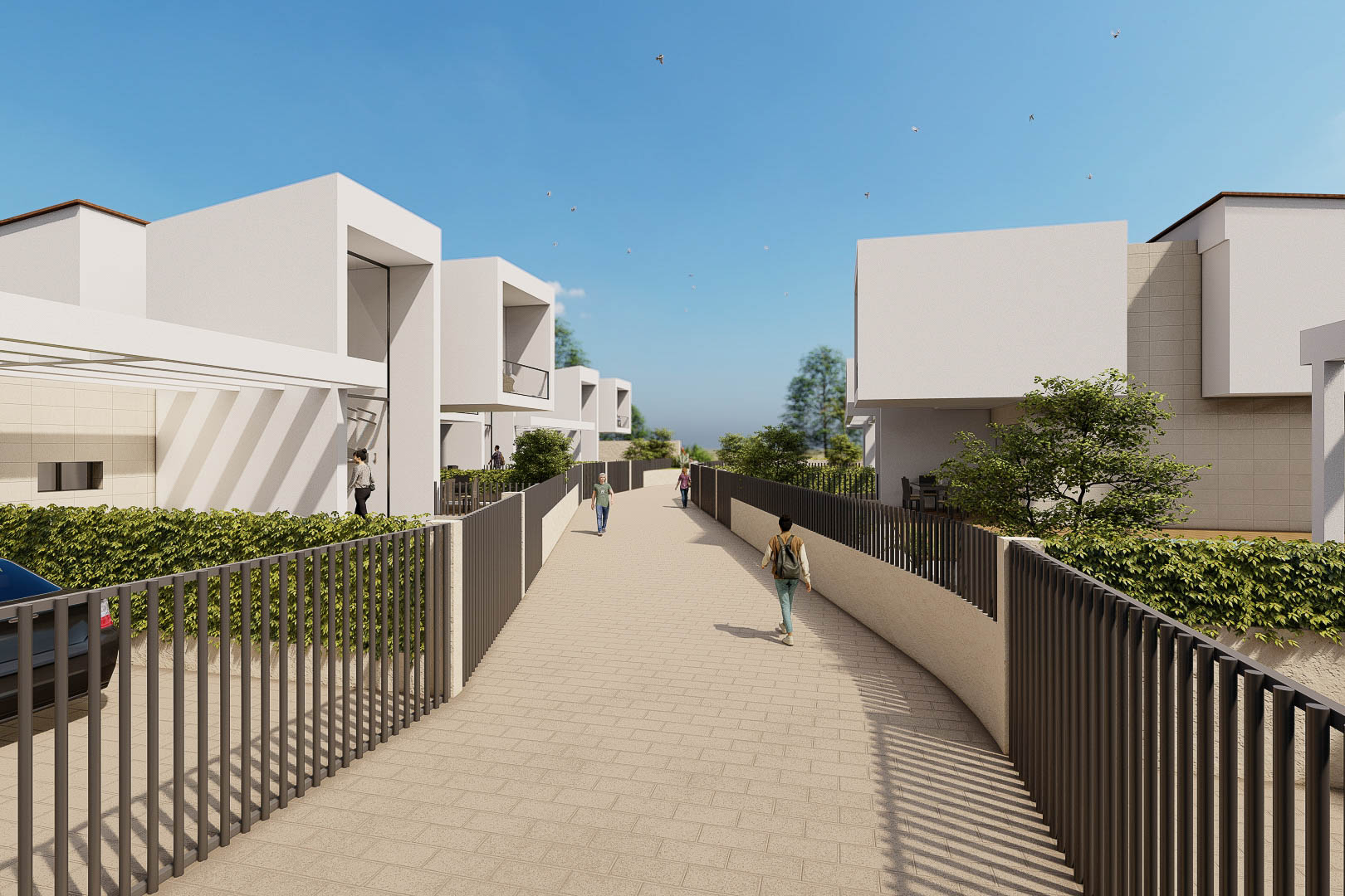 Vue extérieure du complexe avec des villas blanches minimalistes, des clôtures métalliques sombres et une allée pavée bordée de haies.