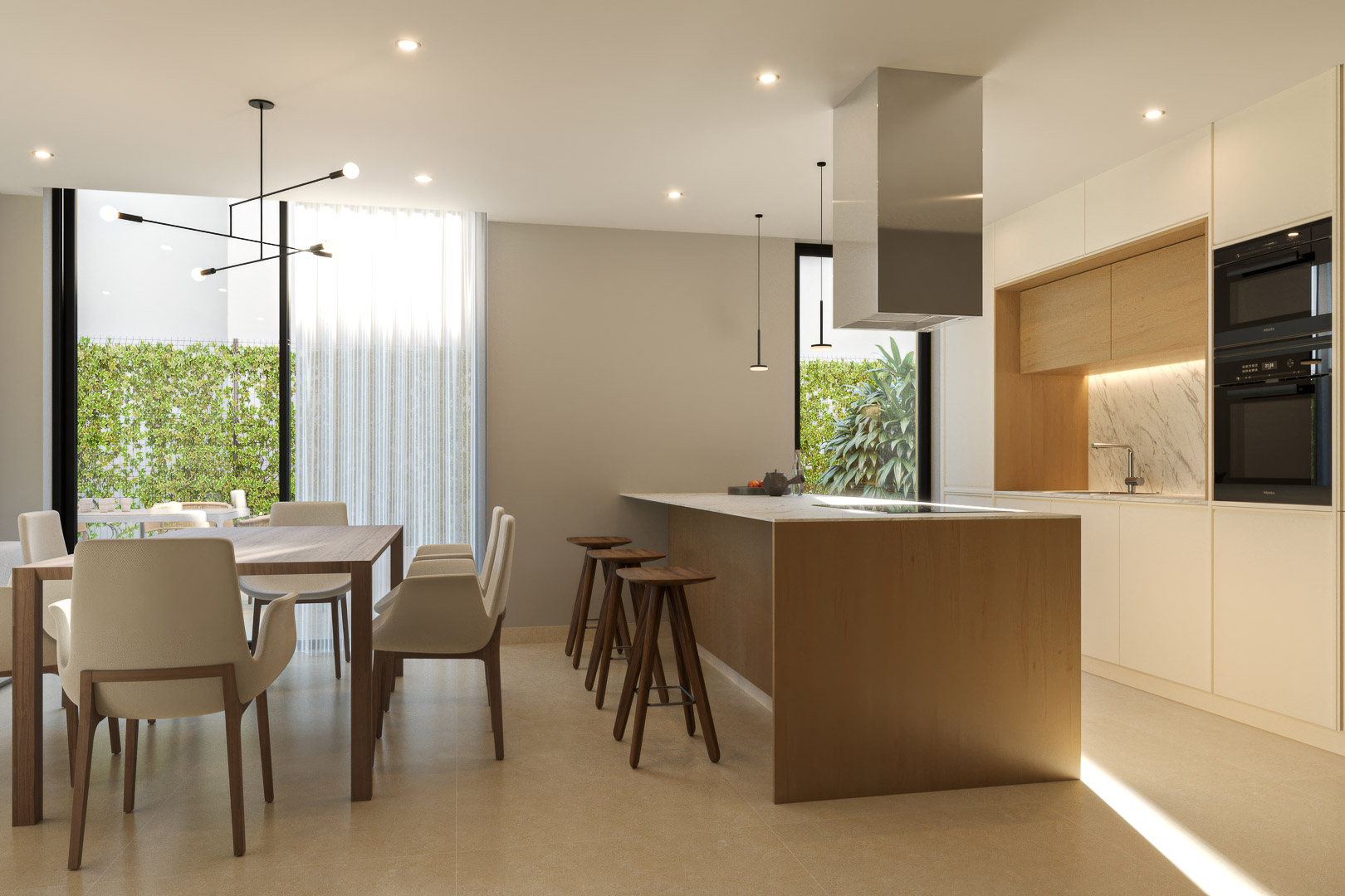 Cuisine moderne avec îlot en bois et plan de travail en marbre, ouverte sur un espace salle à manger lumineux avec accès visuel au jardin extérieur.