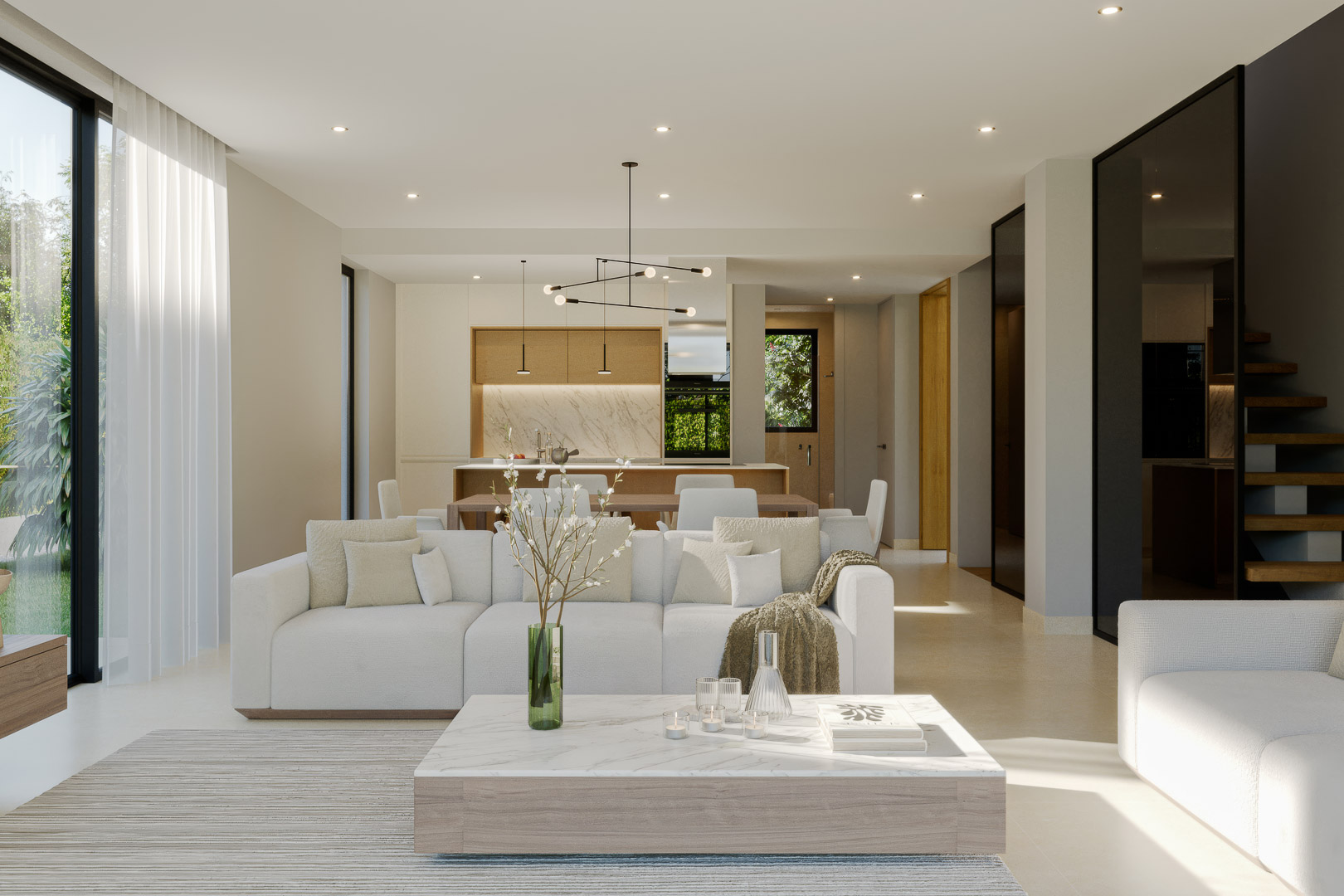 Salon à aire ouverte avec canapés blancs, table basse en marbre et cuisine intégrée. De grandes baies vitrées inondent l'espace de lumière et offrent une vue sur le jardin.