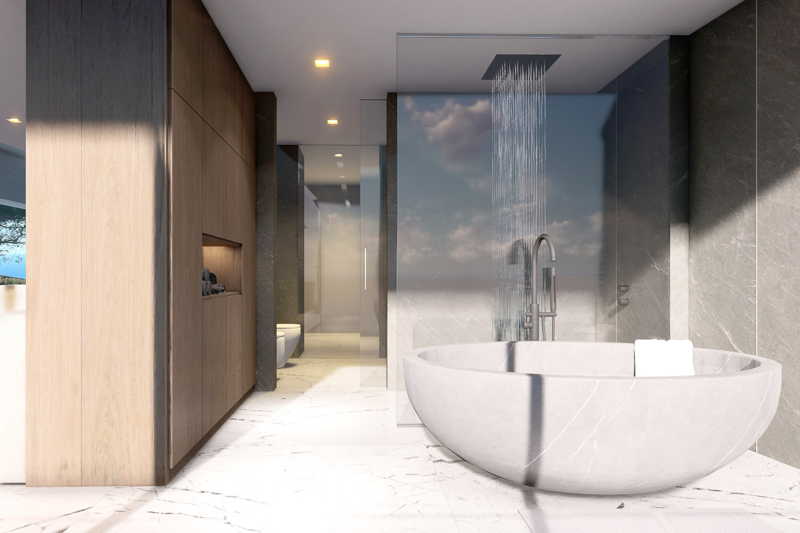 Détail d'une salle de bain moderne avec baignoire en marbre et douche à effet pluie.