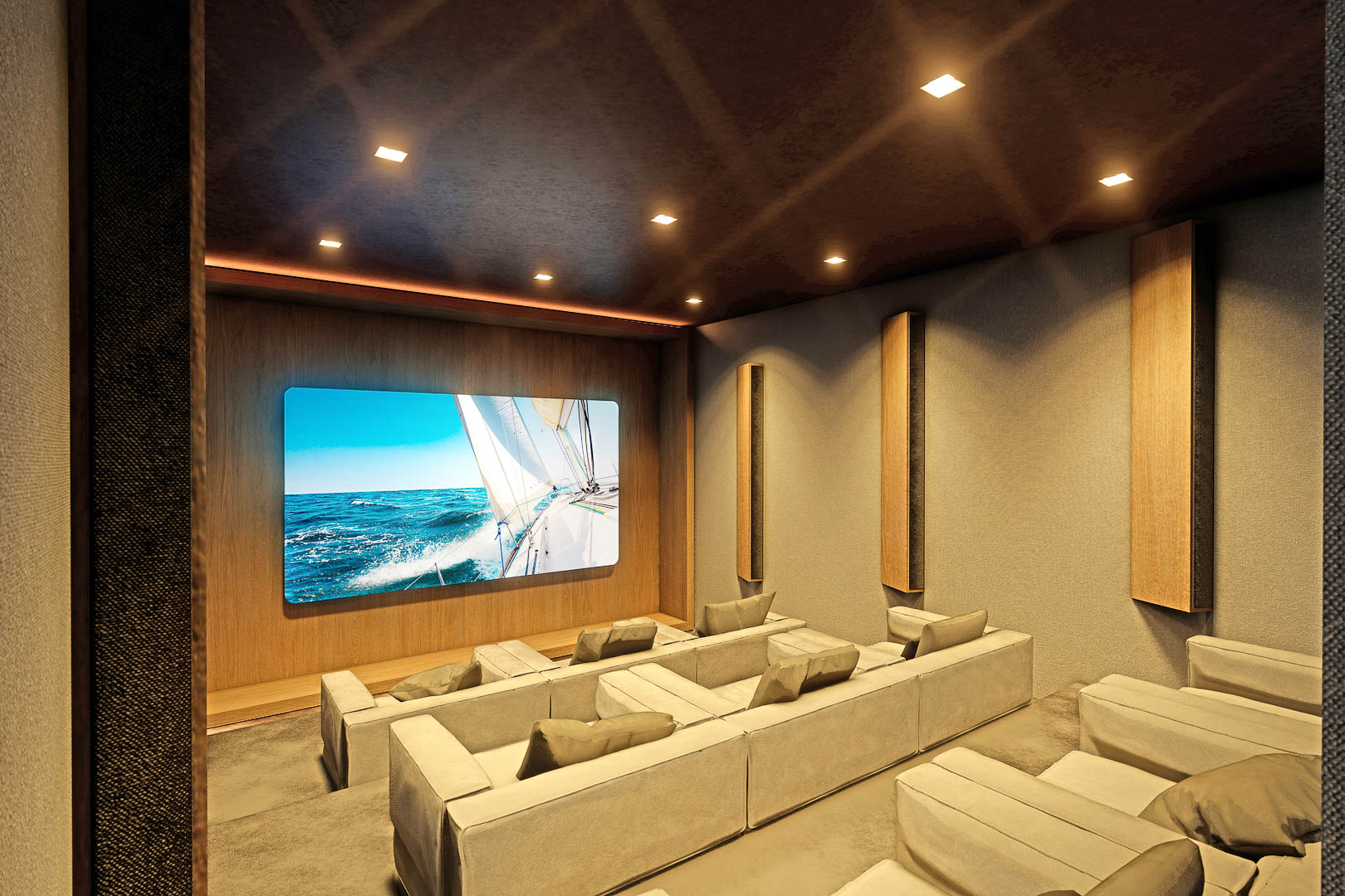 Salle de cinéma maison avec canapés modulables et écran affichant une image de voilier.