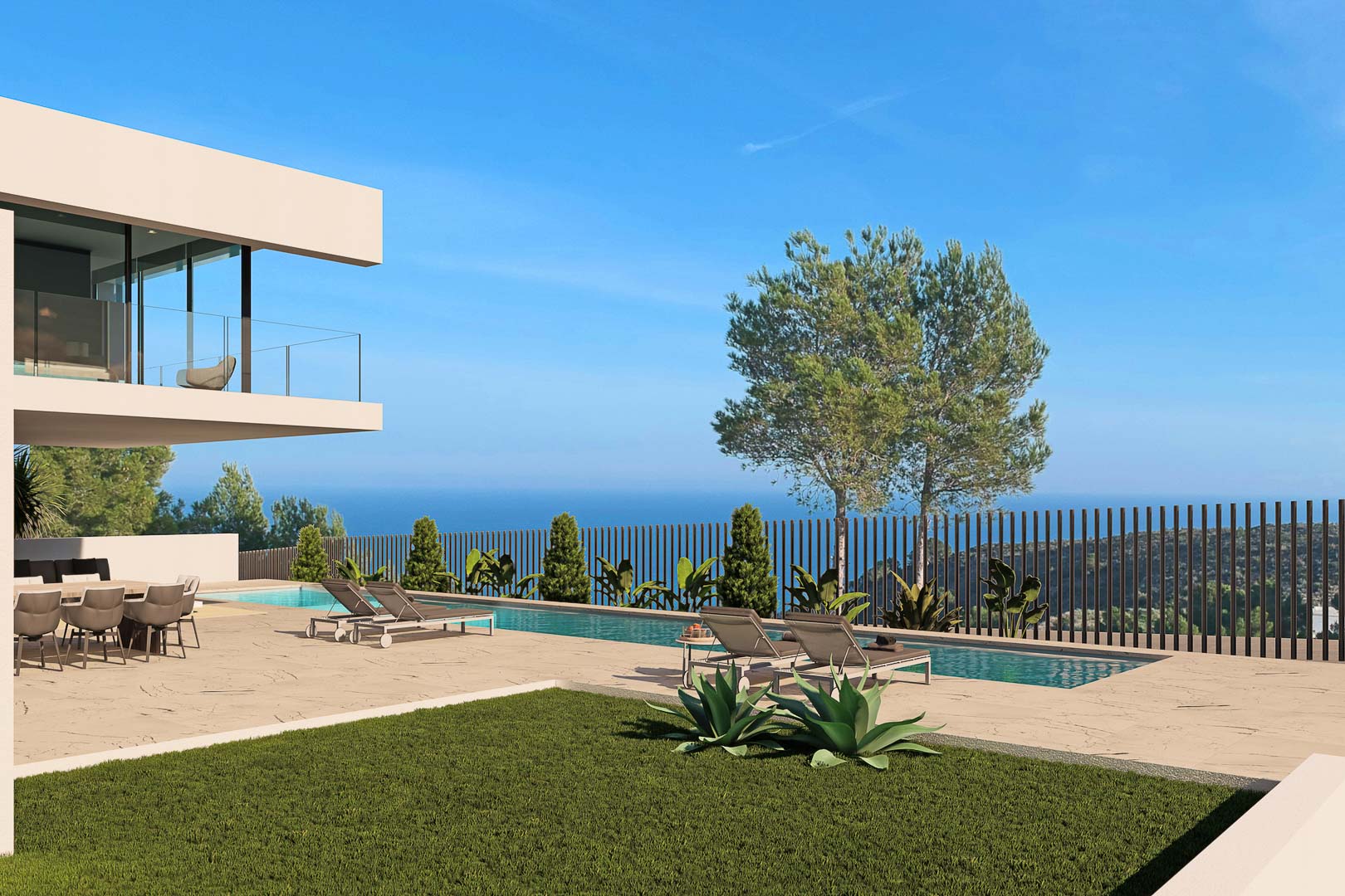 Vue sur la piscine avec chaises longues, jardin et vue mer de la villa à Moraira.