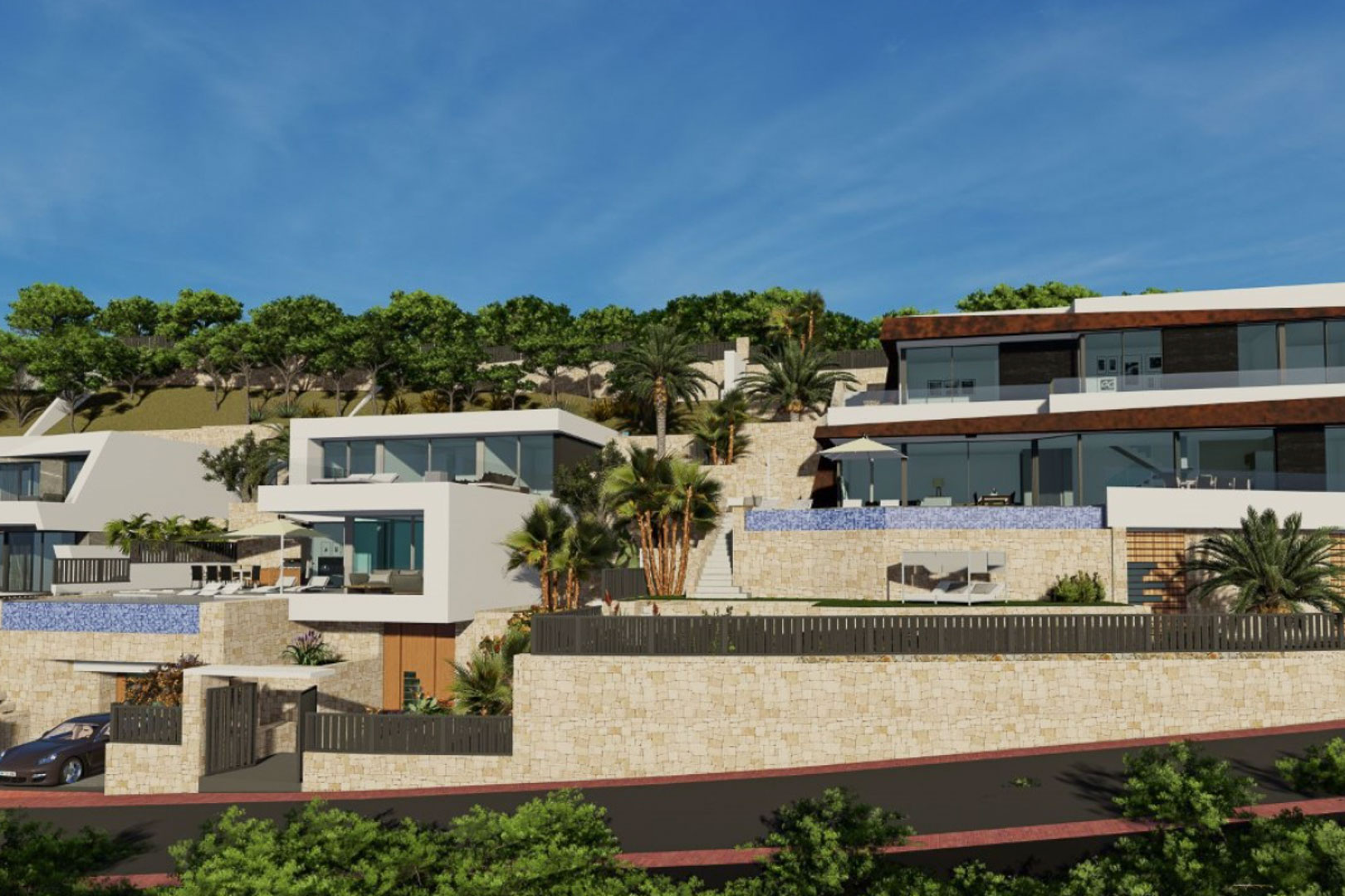 Vue extérieure de l'architecture en terrasses avec murs en pierre naturelle, façades blanches et piscines à débordement intégrées au paysage en pente.