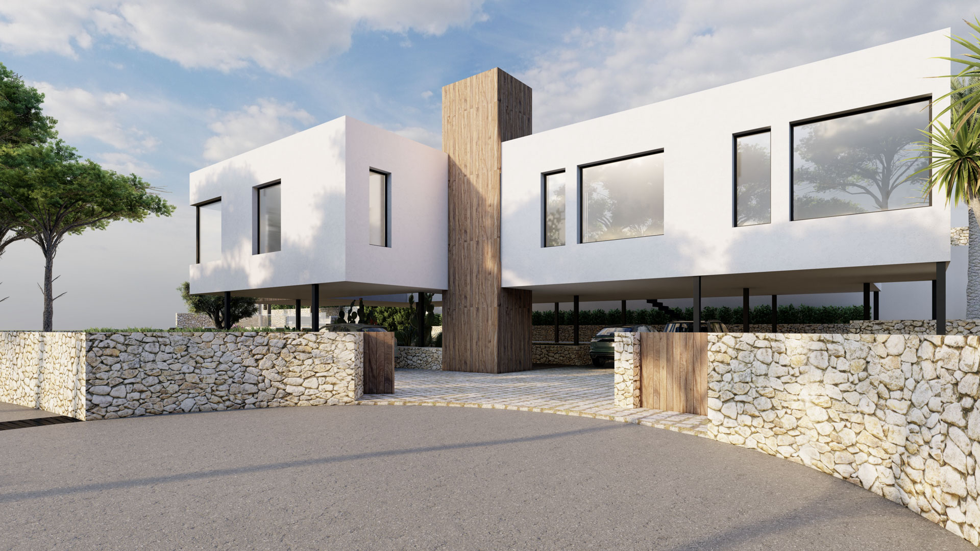 Façade moderne aux volumes blancs avec un élément central en bois. L'étage supérieur sur pilotis crée un vaste parking couvert derrière des murs en pierre naturelle.
