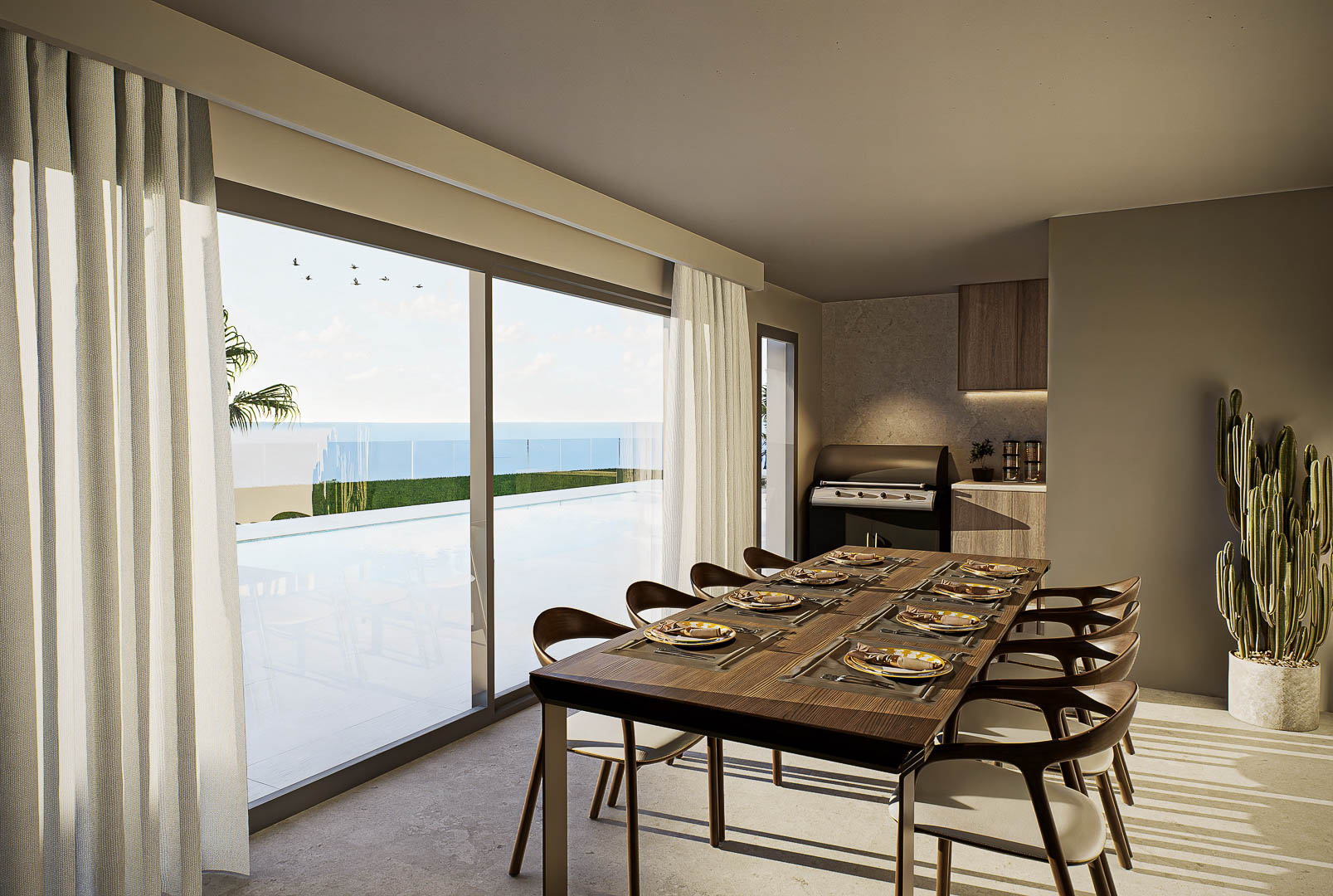 Espace dînatoire raffiné avec table en bois et chaises design, ouvert sur une terrasse avec piscine et vue mer imprenable grâce à de larges baies vitrées.