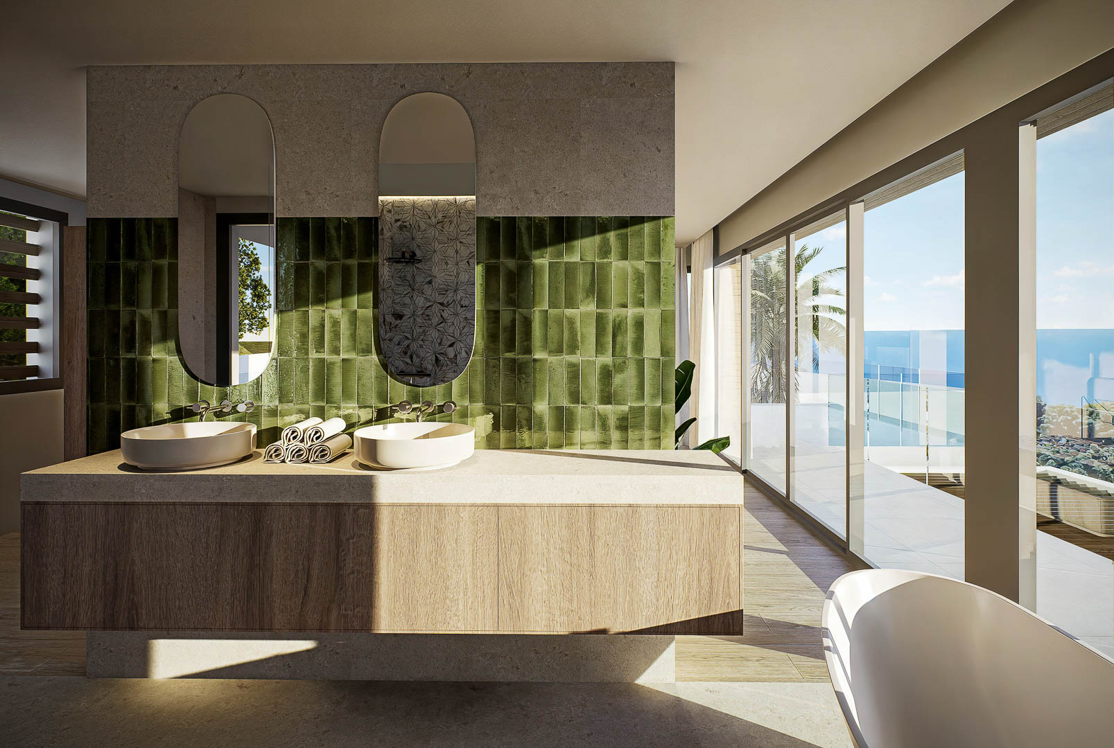 Salle de bain principale avec double vasque, carrelage vert vertical et baies vitrées ouvrant sur une terrasse avec vue imprenable sur la mer.