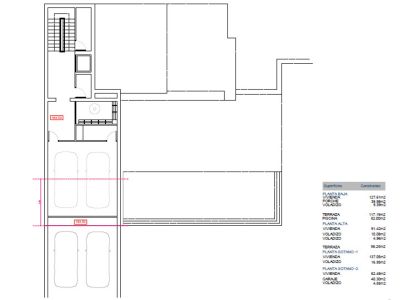 Plan architectural détaillé du rez-de-chaussée avec garage double, escalier et distribution des espaces.