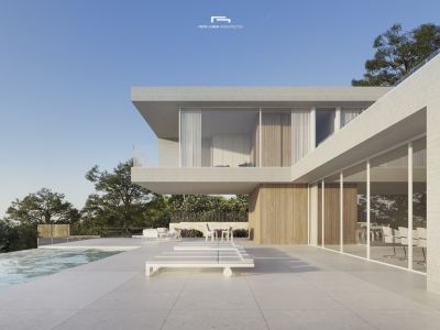 Vue extérieure de la villa avec piscine à débordement et terrasse solarium avec transats blancs.