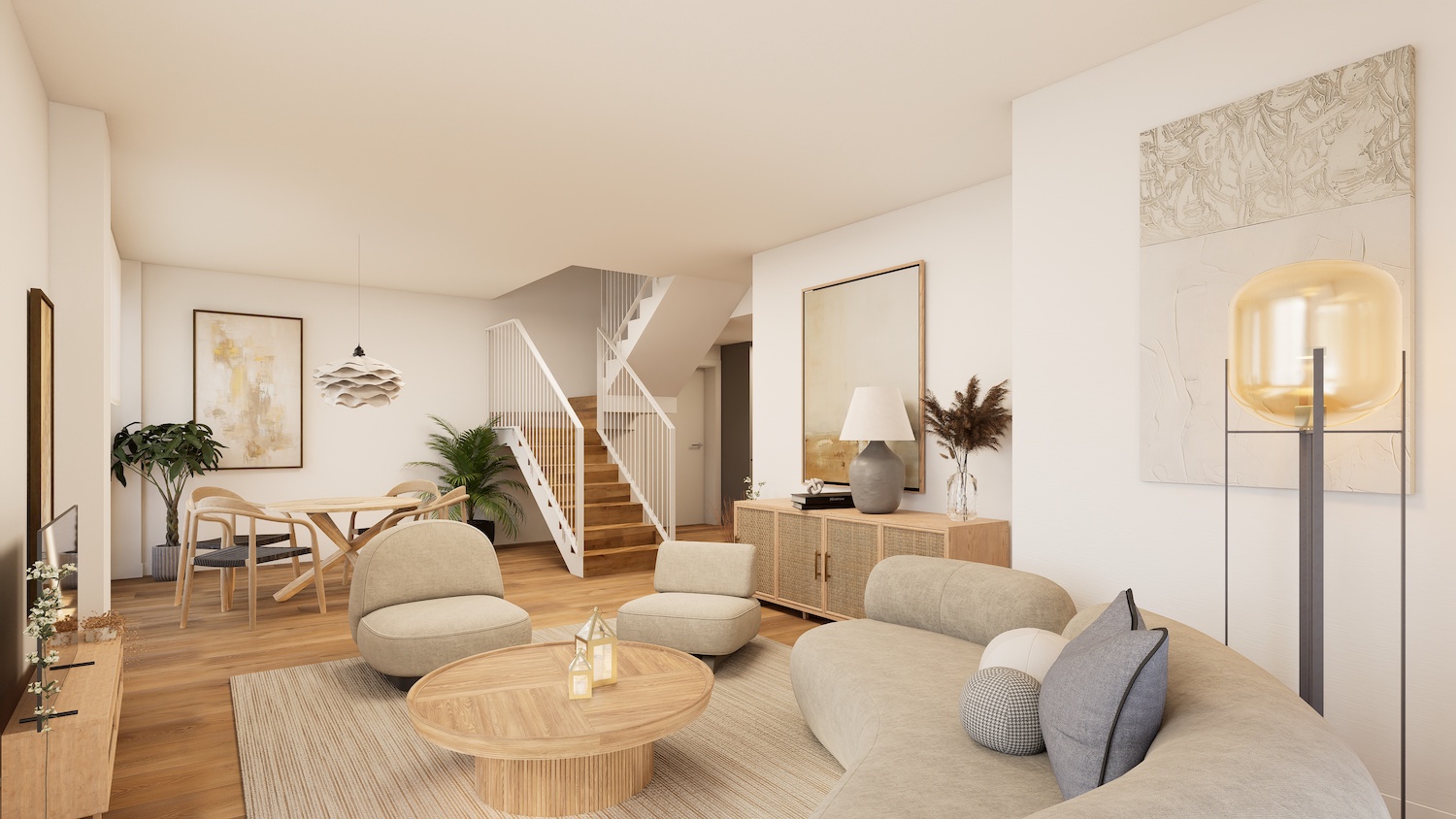 Espace de vie et salle à manger ouverts avec canapé incurvé, deux fauteuils et table basse ronde en bois sur un tapis tissé. Un escalier en bois moderne relie les étages.