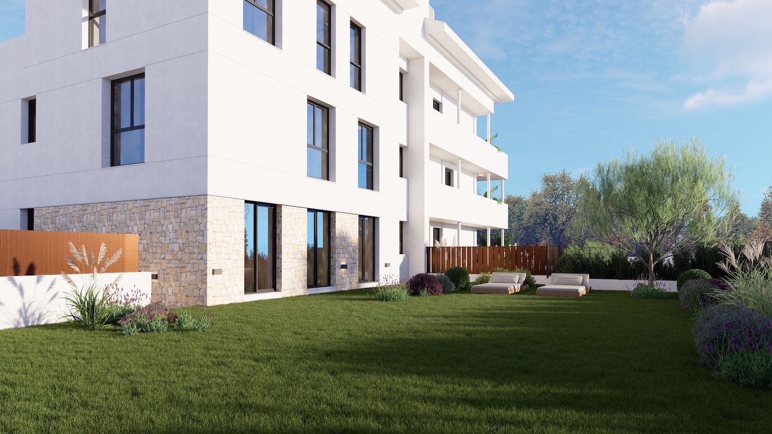 L'immeuble blanc moderne présente un soubassement en pierre et de grandes baies vitrées s'ouvrant sur une vaste pelouse. Aménagement paysager méditerranéen avec chaises longues.