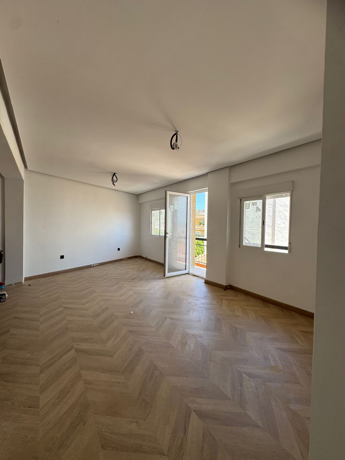 Salon avec accès au balcon