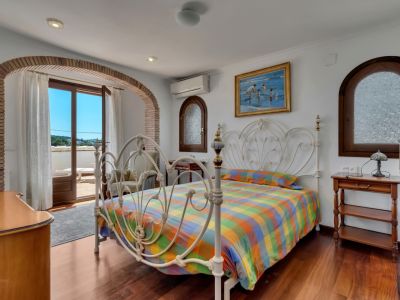 Chambre avec accès à la terrasse