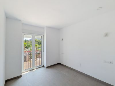 Chambre avec accès au balcon