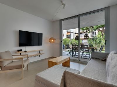Salon avec accès à la terrasse
