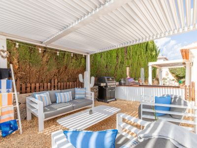 Terrasse couverte avec barbecue