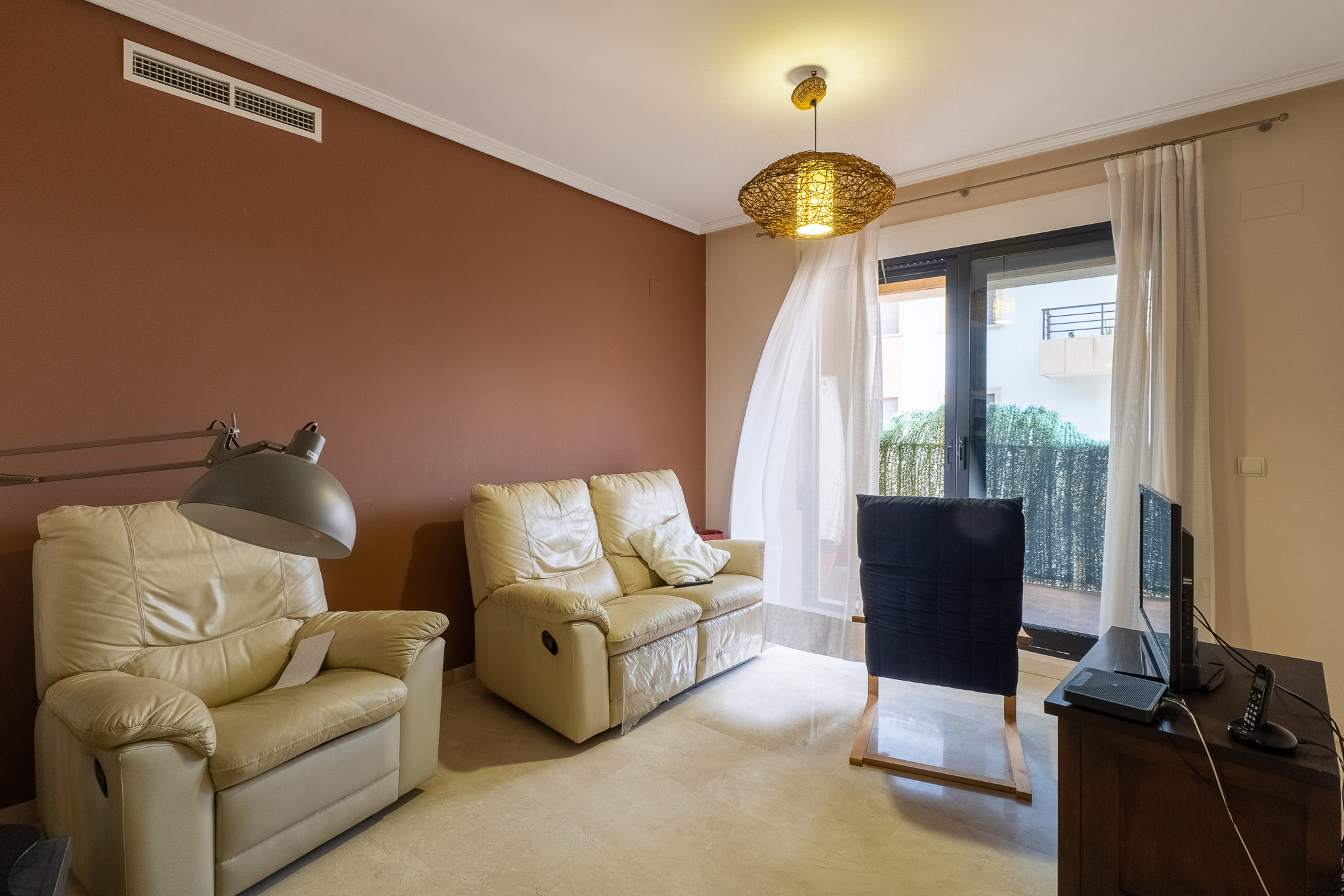 Salon avec accès au balcon