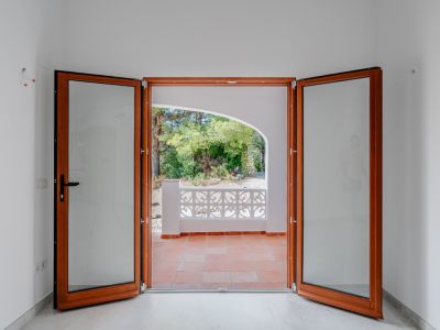 Accès à la terrasse couverte