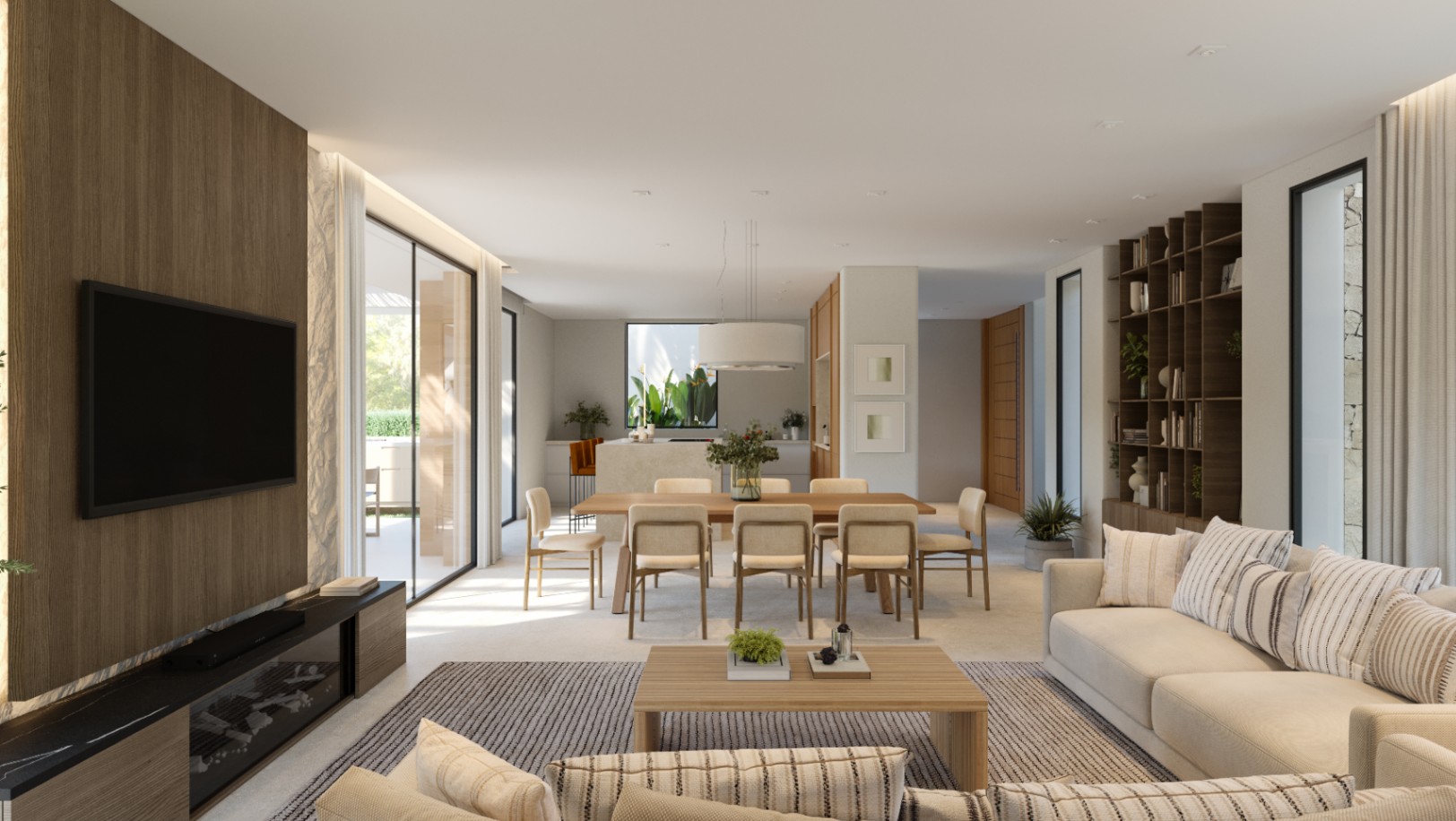 Espace de vie ouvert comprenant un mur TV en bois, une salle à manger pour six personnes et une cuisine moderne avec îlot en pierre. De larges baies vitrées mènent à la terrasse.