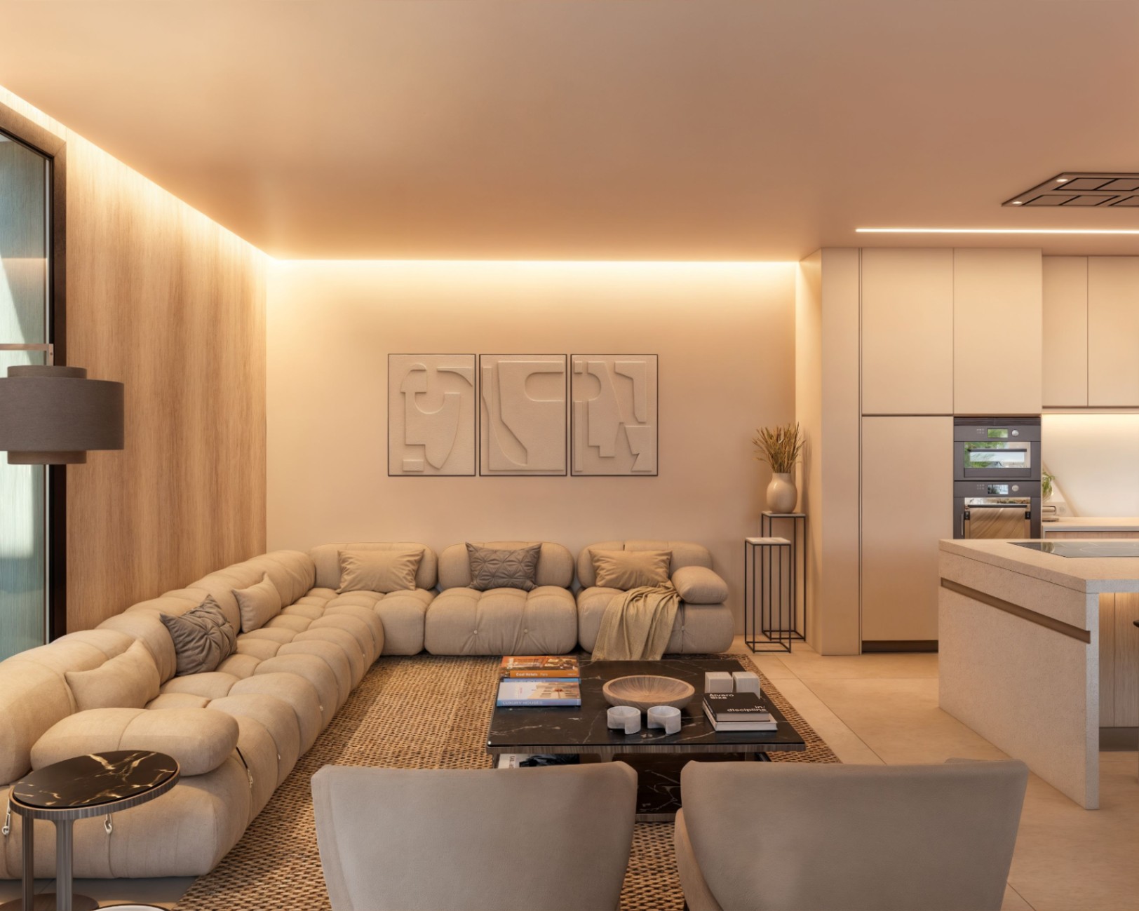 Espace de vie ouvert comprenant un canapé modulaire capitonné, une table en marbre noir et une cuisine intégrée avec éclairage LED indirect et mur en bois.