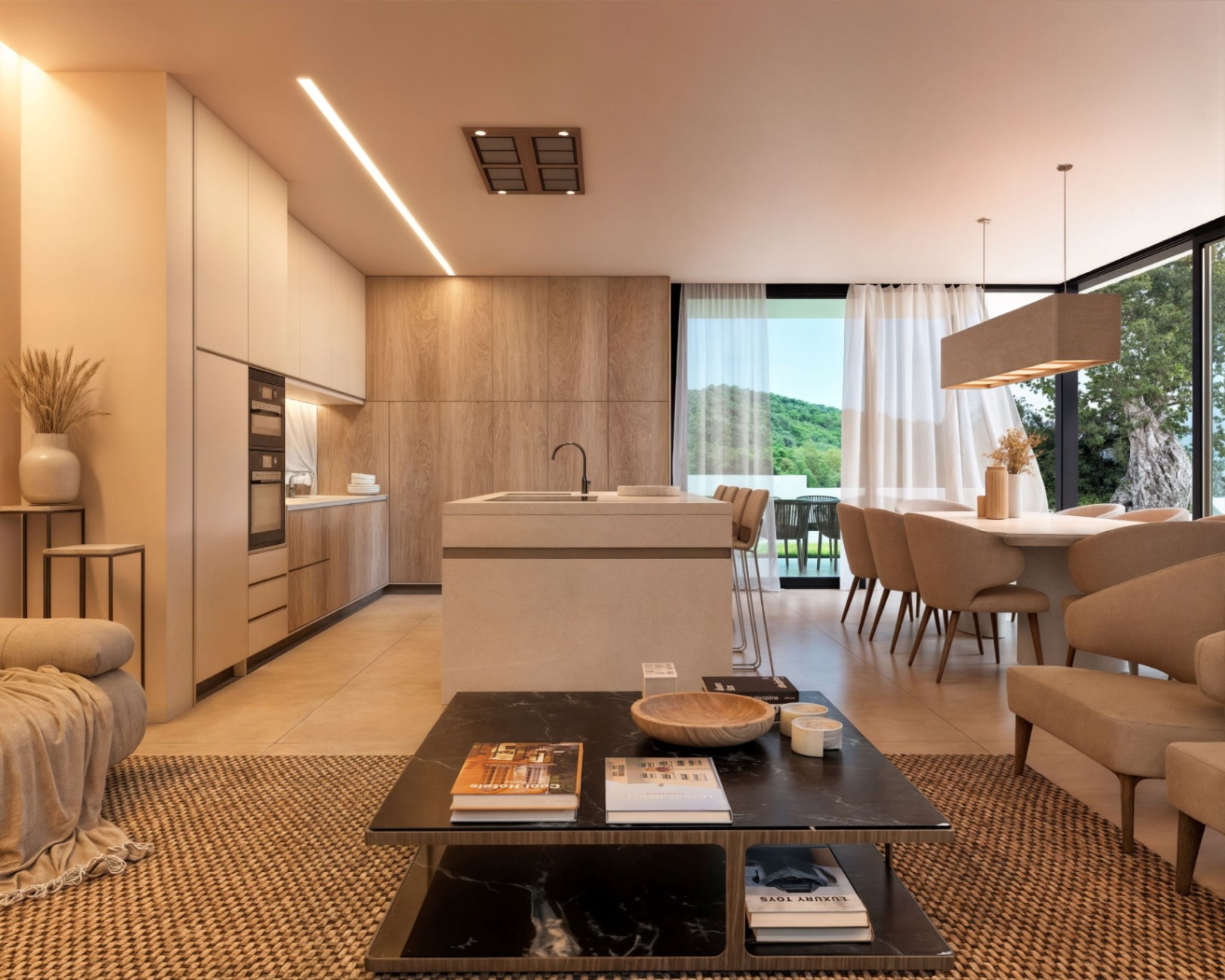 Espace de vie ouvert comprenant une cuisine minimaliste en bois, un îlot central en pierre et une salle à manger offrant une vue sur les collines via de larges baies vitrées.