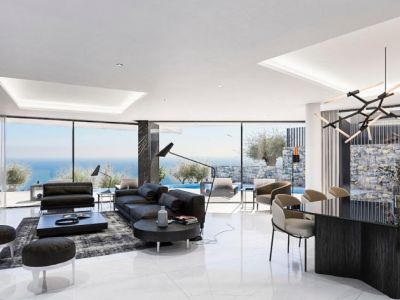 Salon-salle à manger spacieux avec baies vitrées et décor moderne dans des tons neutres.
