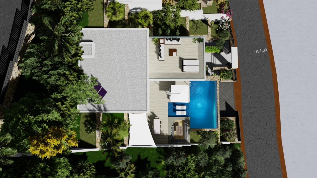 Vue aérienne de la villa avec piscine, terrasse et jardin luxuriant.