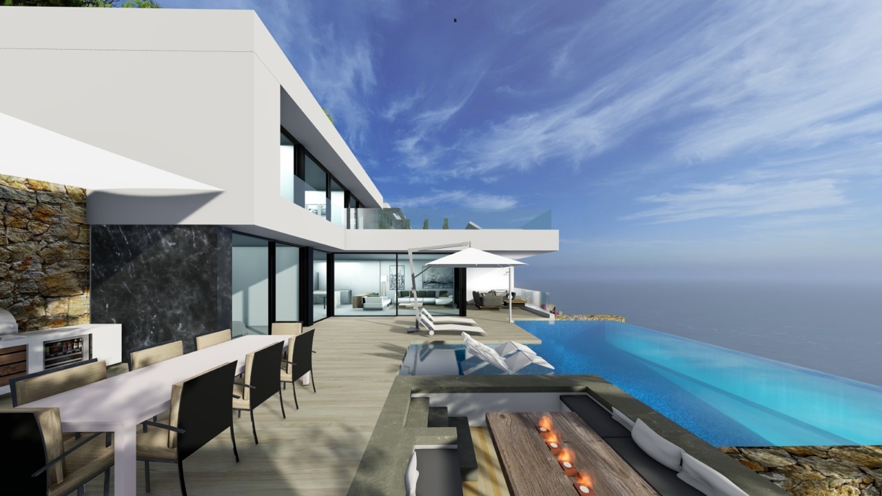 Vue de la terrasse avec piscine à débordement, coin repas extérieur et vue sur la mer.