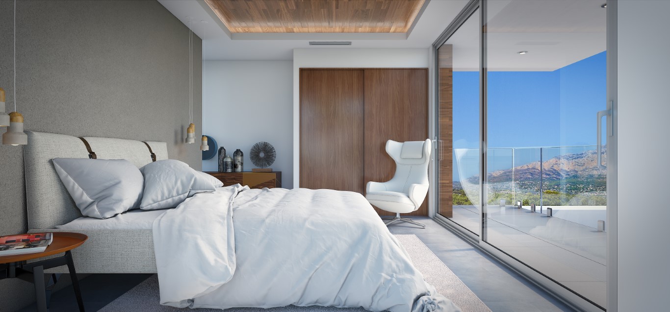 Chambre moderne avec placards intégrés en bois, plafond avec insert en bois et grandes baies vitrées donnant sur une terrasse privée avec vue sur les montagnes.