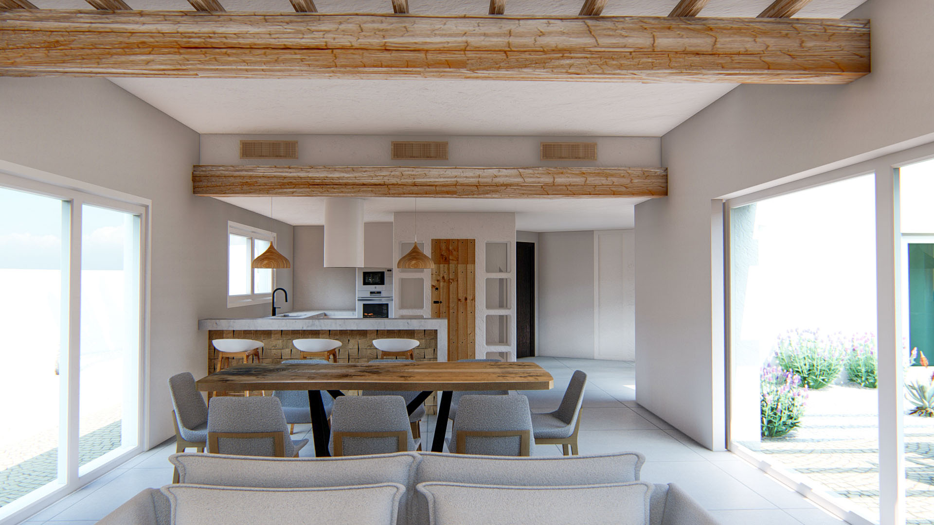 Espace de vie ouvert avec poutres apparentes en bois, cuisine équipée avec îlot central et grandes baies vitrées offrant une luminosité naturelle.
