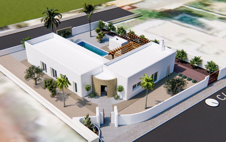 Vue aérienne de la villa de style ibizien avec façade blanche, piscine centrale et pergola en bois. L'entrée en pierre et le jardin méditerranéen complètent l'ensemble.