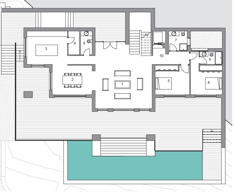 Plan technique du niveau principal présentant le salon-salle à manger, la cuisine, deux chambres en suite et une vaste terrasse avec piscine.
