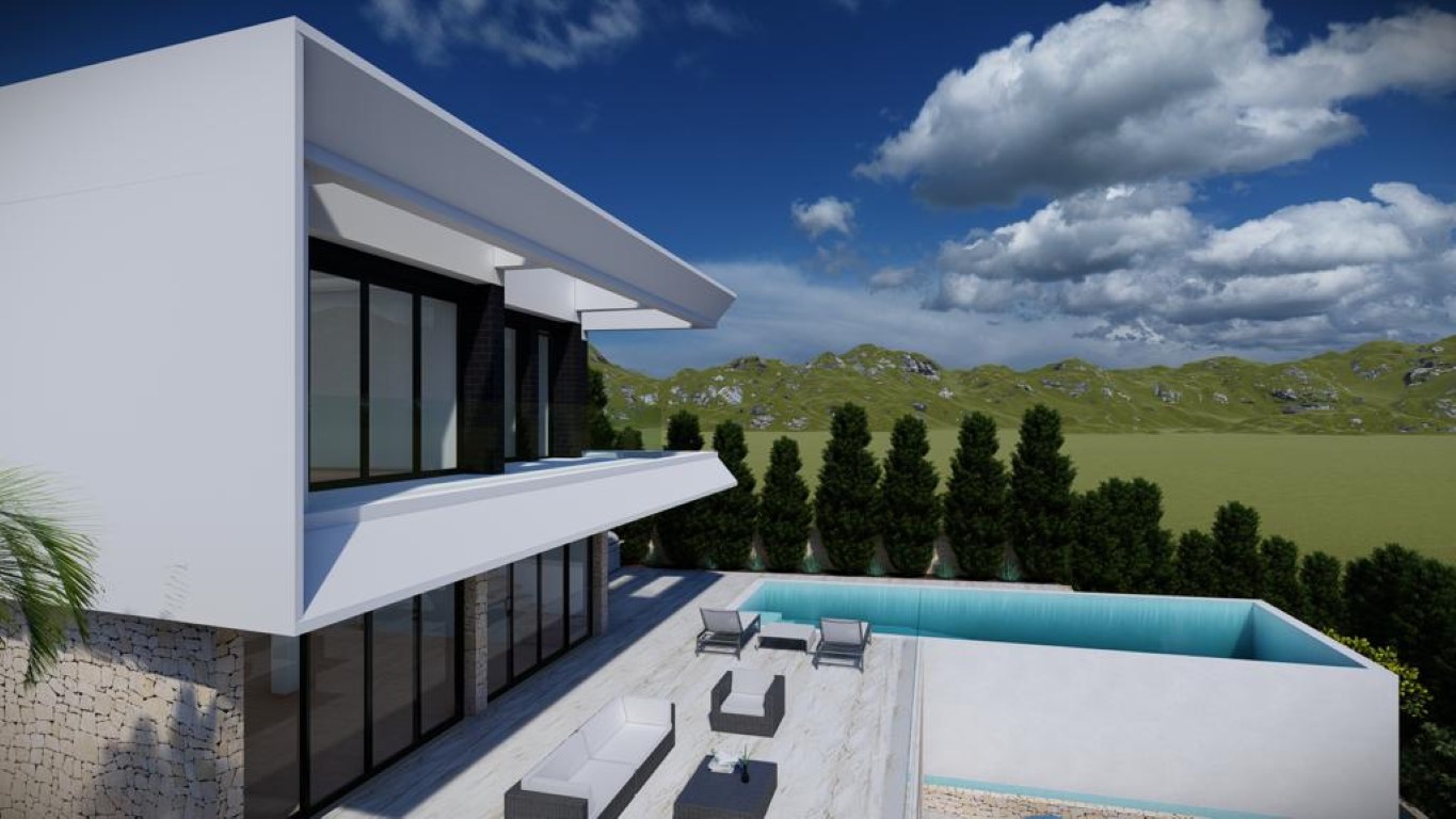 Vue extérieure de la villa avec piscine à débordement, terrasse aménagée et façade blanche minimaliste agrémentée de murs en pierre naturelle.