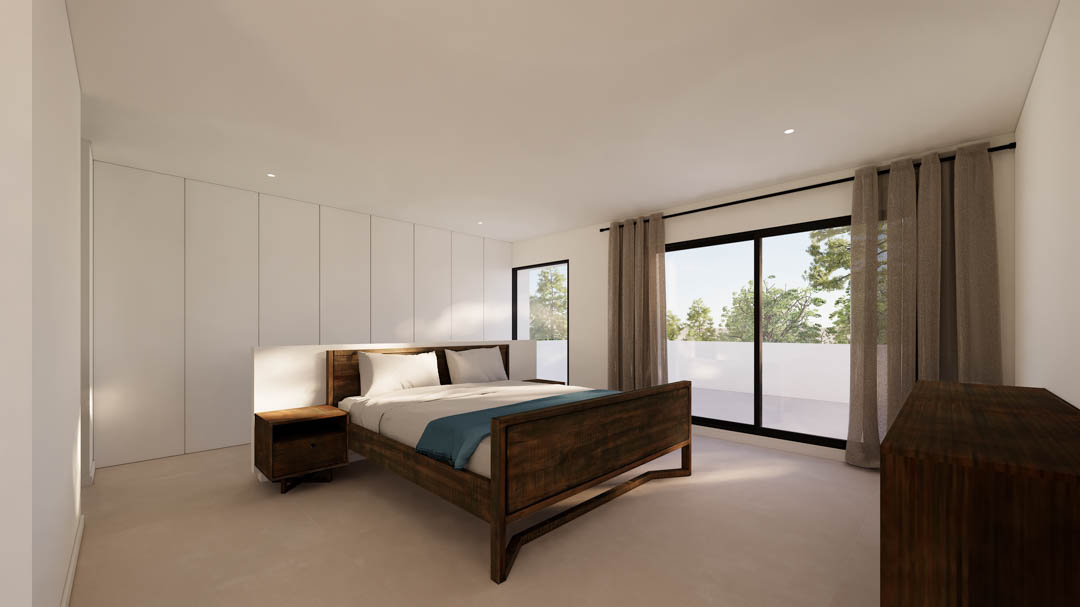 Chambre avec placards intégrés blancs, mobilier en bois massif et grandes baies vitrées coulissantes menant à une terrasse ensoleillée.