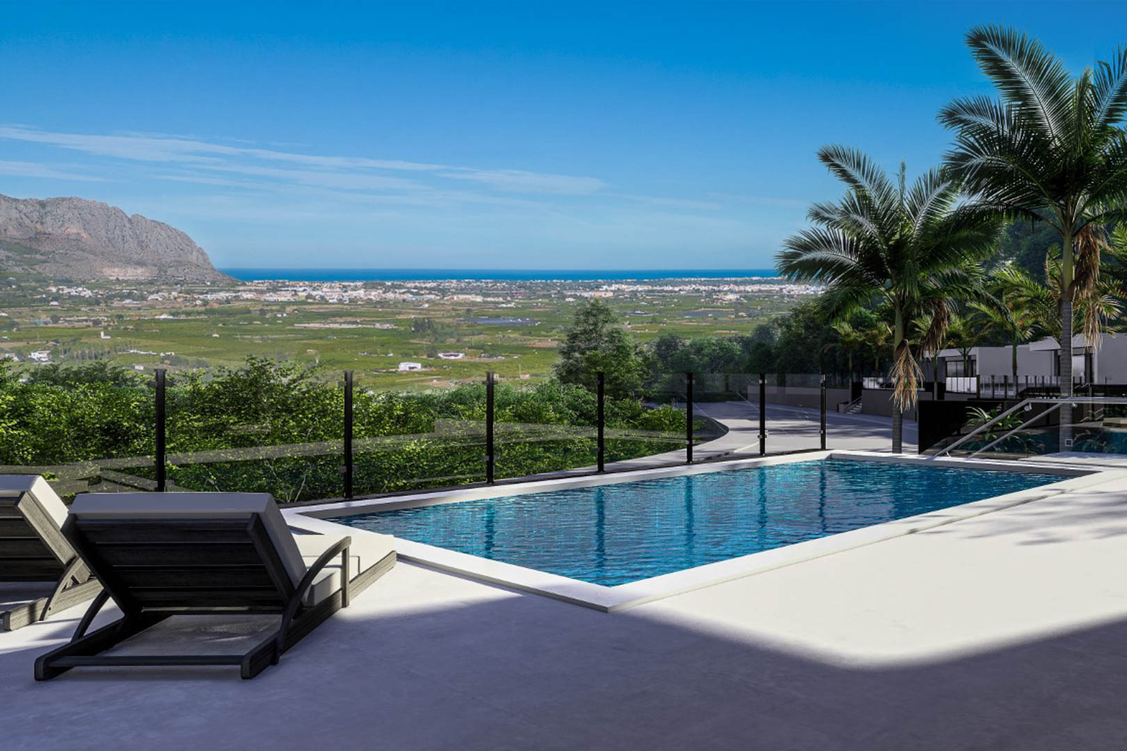 Terrasse extérieure avec piscine de 6x3 mètres et garde-corps en verre, offrant une vue panoramique imprenable sur la vallée de Pedreguer et la mer.