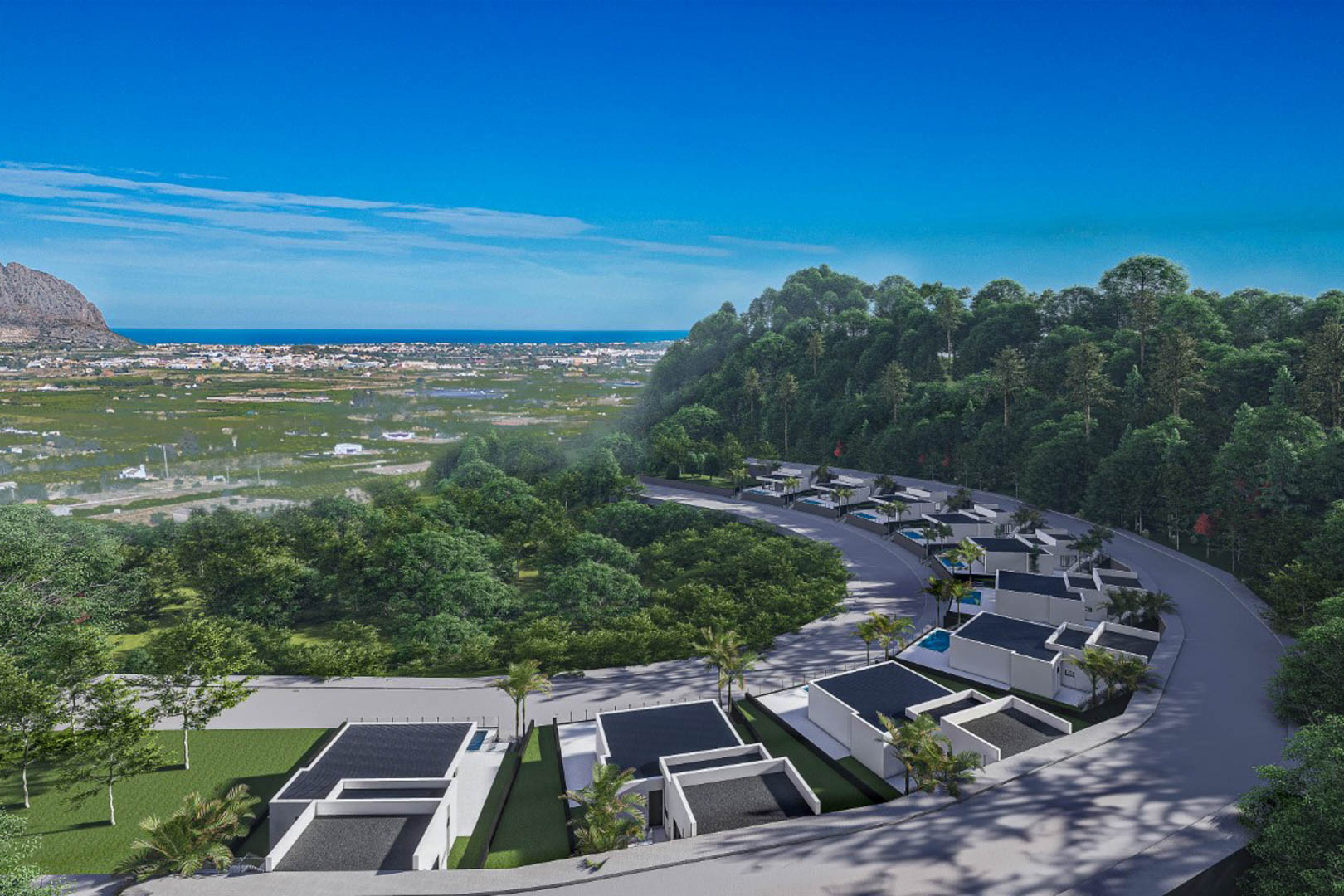 Vue aérienne du complexe résidentiel à Monte Solana, présentant des villas modernes intégrées à la colline avec une vue panoramique sur la vallée et la mer.