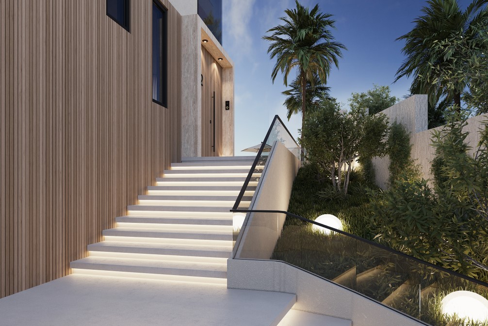 Entrée moderne avec escaliers illuminés et bardage en bois vertical. Jardin paysager latéral avec éclairage sphérique.