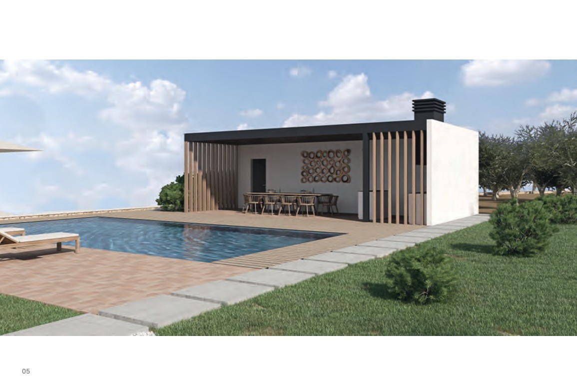 Pavillon de repas extérieur moderne avec persiennes en bois, cuisine intégrée et grande table, situé à côté de la piscine et de la terrasse ensoleillée.