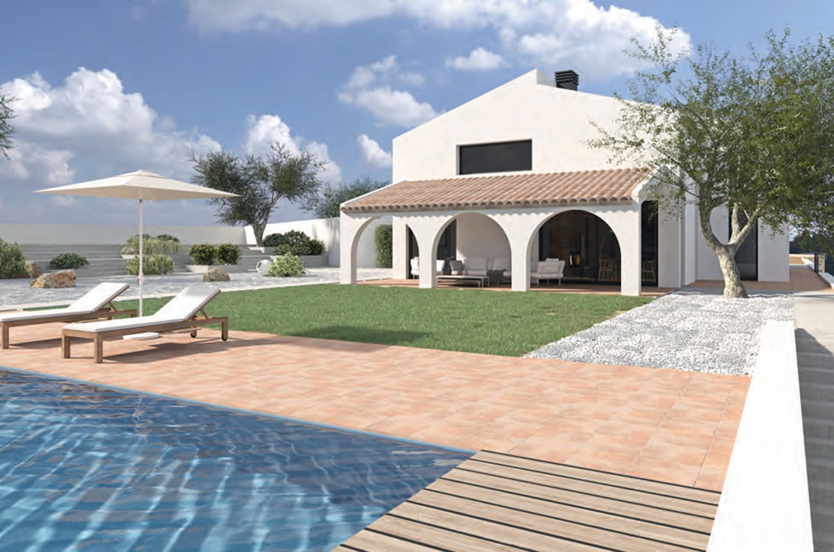 Vue extérieure de la piscine et du solarium en terre cuite, mettant en valeur le porche à arches traditionnel et le jardin méditerranéen.
