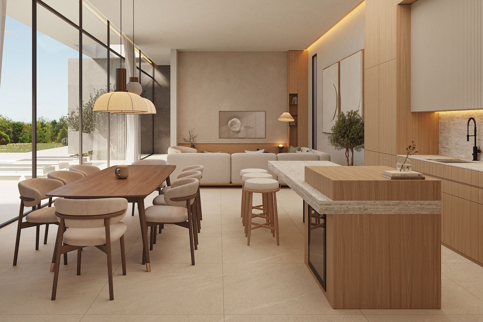 Espace de vie ouvert avec cuisine en bois et îlot en pierre, salle à manger élégante et baies vitrées offrant une transition fluide vers l'extérieur.