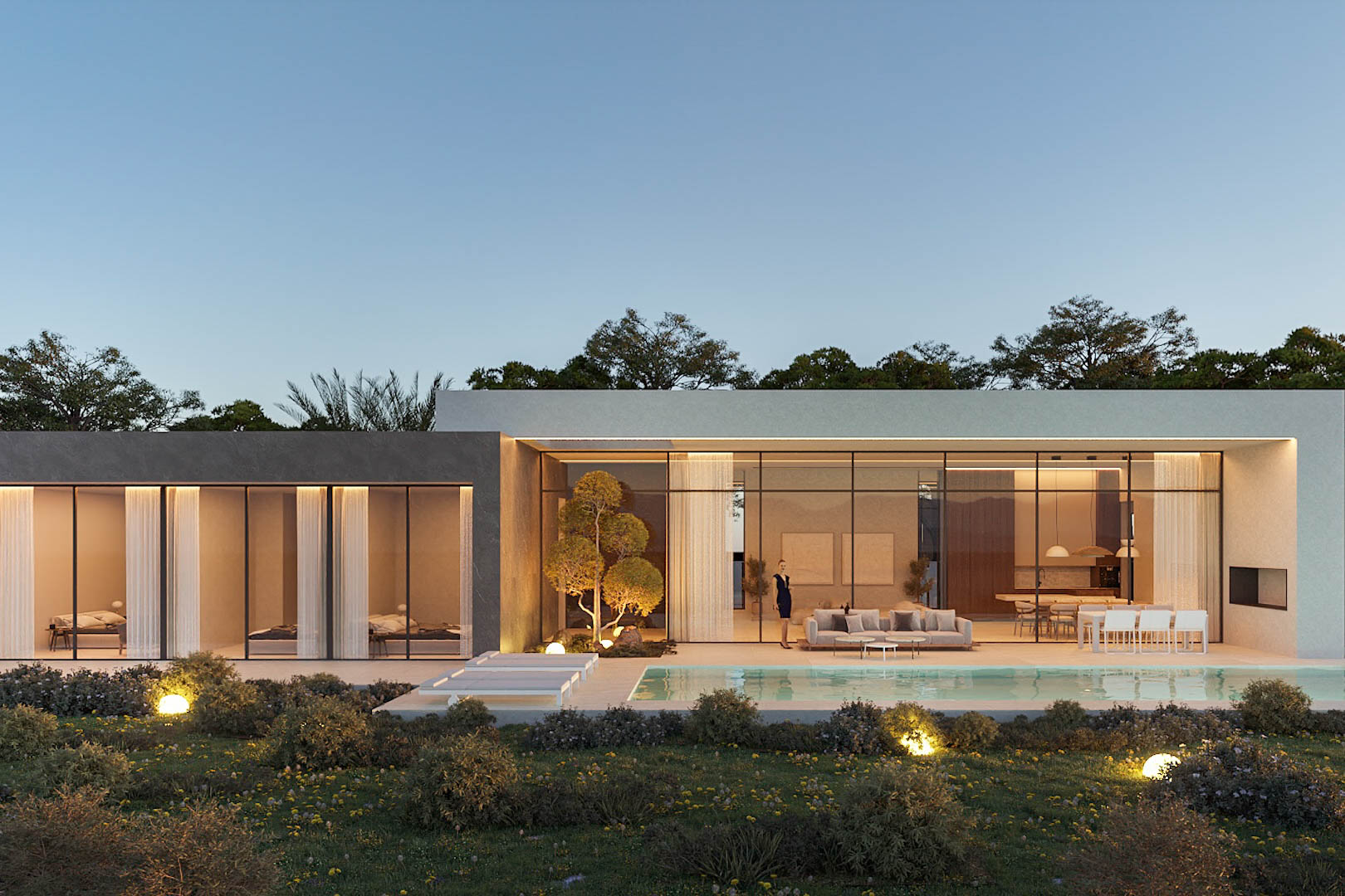 Vue extérieure au crépuscule avec façades vitrées, piscine et jardin méditerranéen. L'éclairage chaleureux souligne l'architecture moderne et les espaces de vie ouverts de plain-pied.