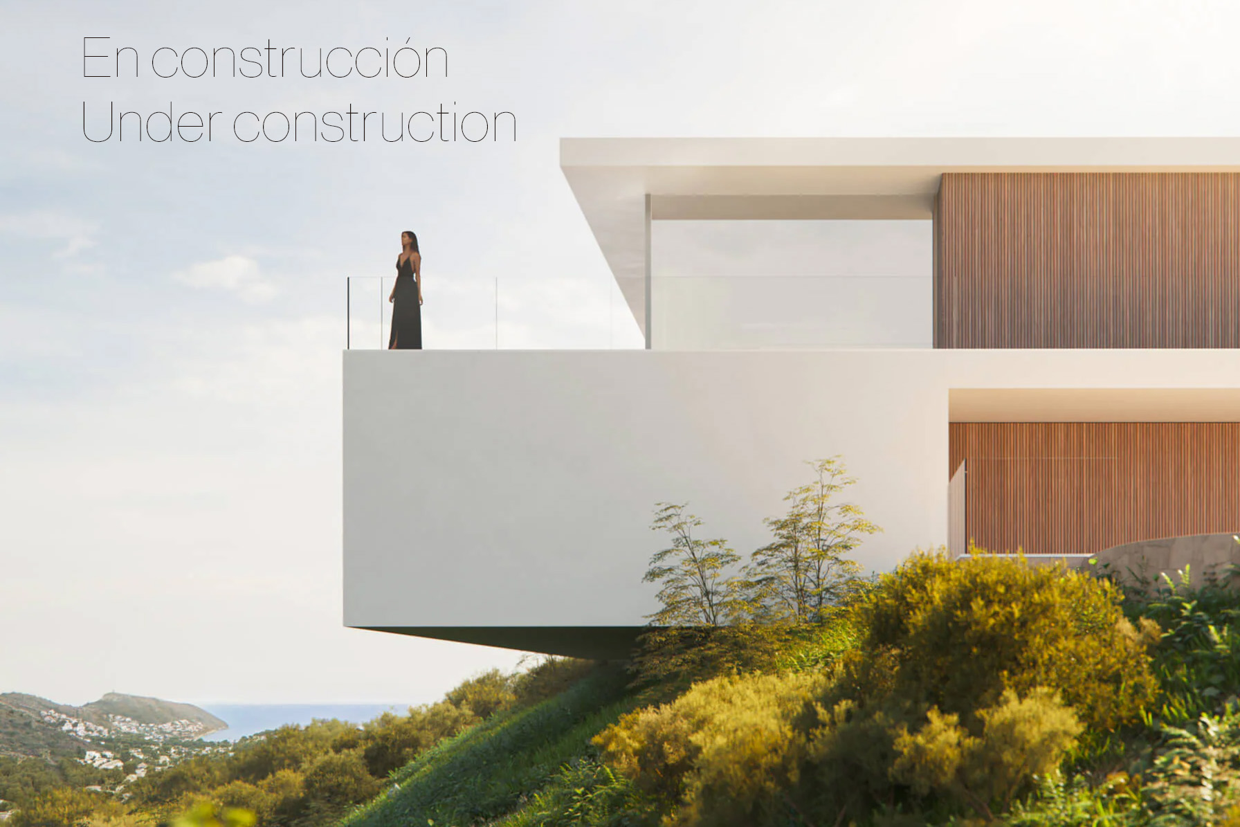 Façade architecturale d'avant-garde avec terrasse en porte-à-faux, garde-corps en verre et bardage bois, offrant une vue panoramique sur la mer.