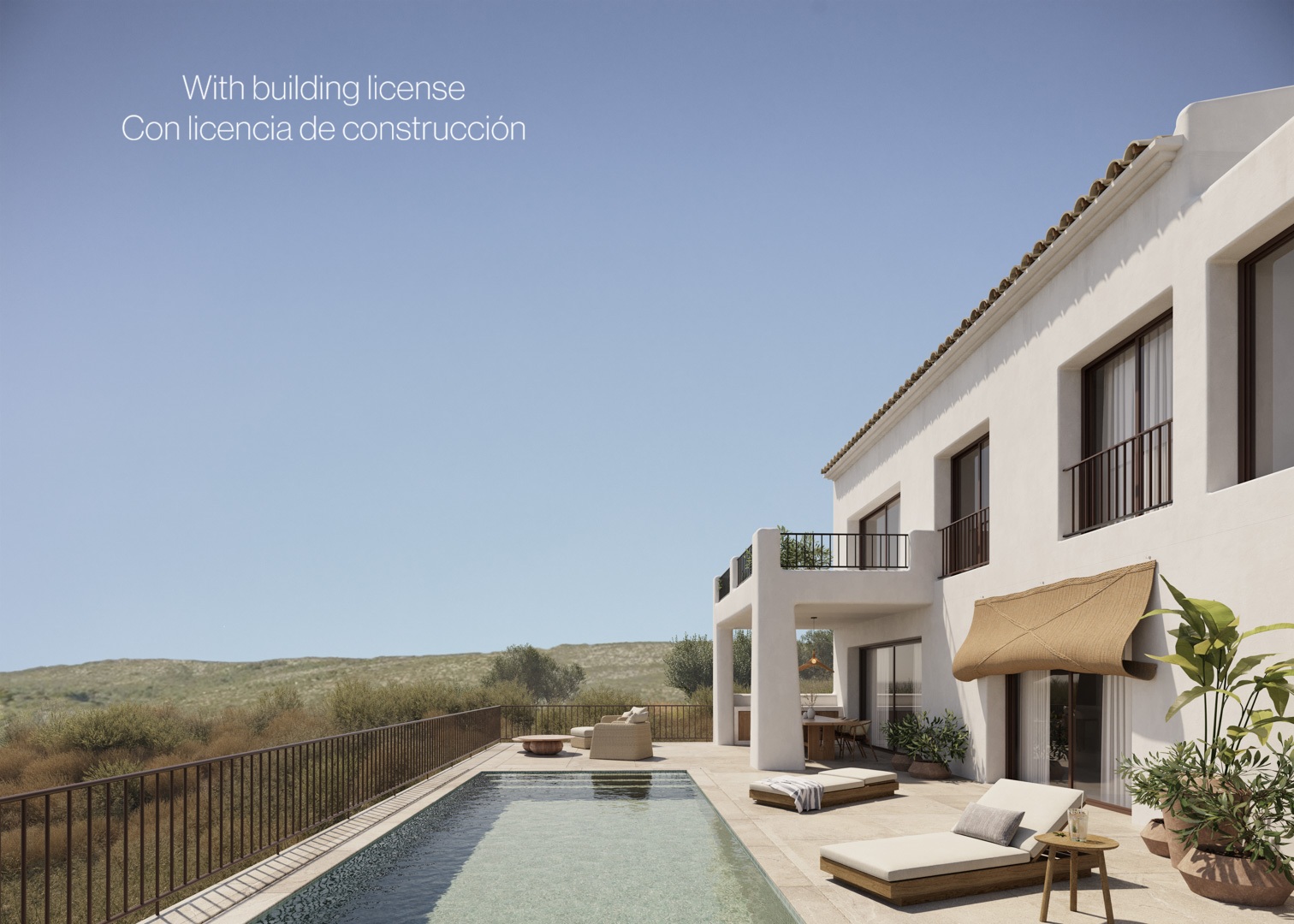 Façade blanche de style ibizien avec piscine de 8x4m, terrasse en pierre naturelle et porche couvert offrant une vue sur la vallée de Jalón.