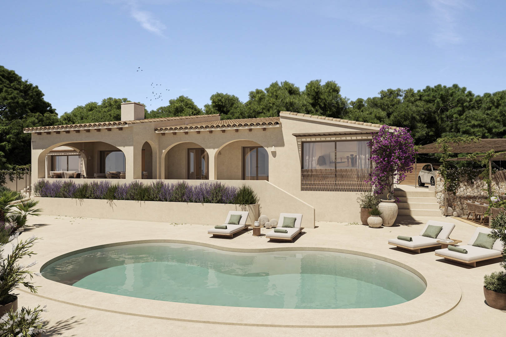 Villa méditerranéenne avec porches à arcades, piscine de forme organique et terrasse ensoleillée bordée de lavande et de bougainvilliers.