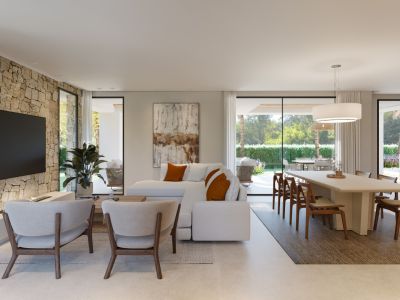 Grand salon-salle à manger ouvert avec mur en pierre, mobilier contemporain et accès direct au jardin par de larges baies vitrées.