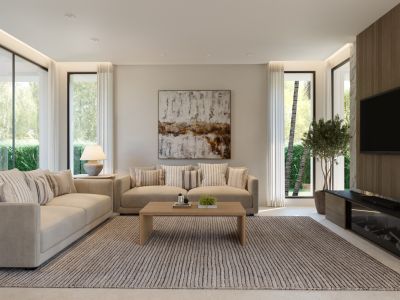 Grand salon doté de deux canapés beiges, d'une table basse en bois et d'un tapis texturé. De grandes fenêtres offrent des vues sur la verdure luxuriante, complété par un mur TV en bois avec cheminée moderne.
