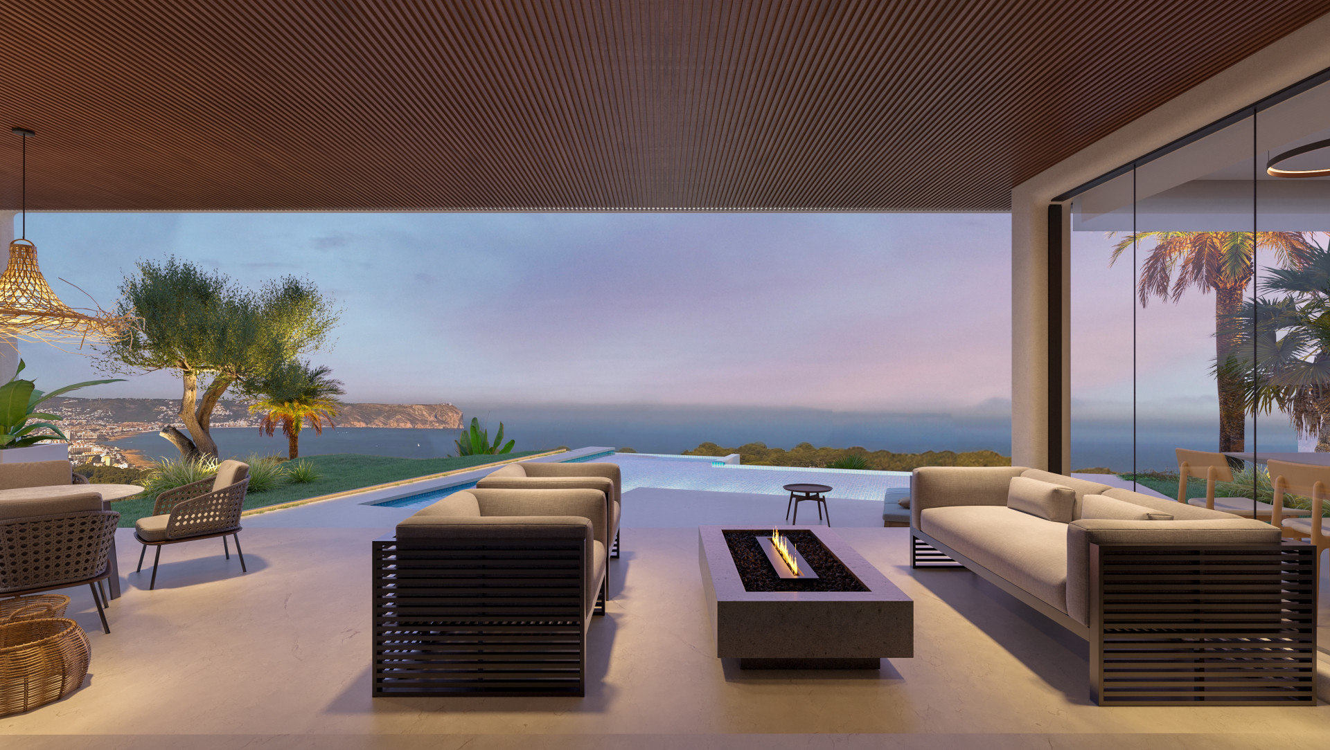 Terrasse avec vue sur la mer et piscine à débordement, mobilier d'extérieur moderne et cheminée basse.